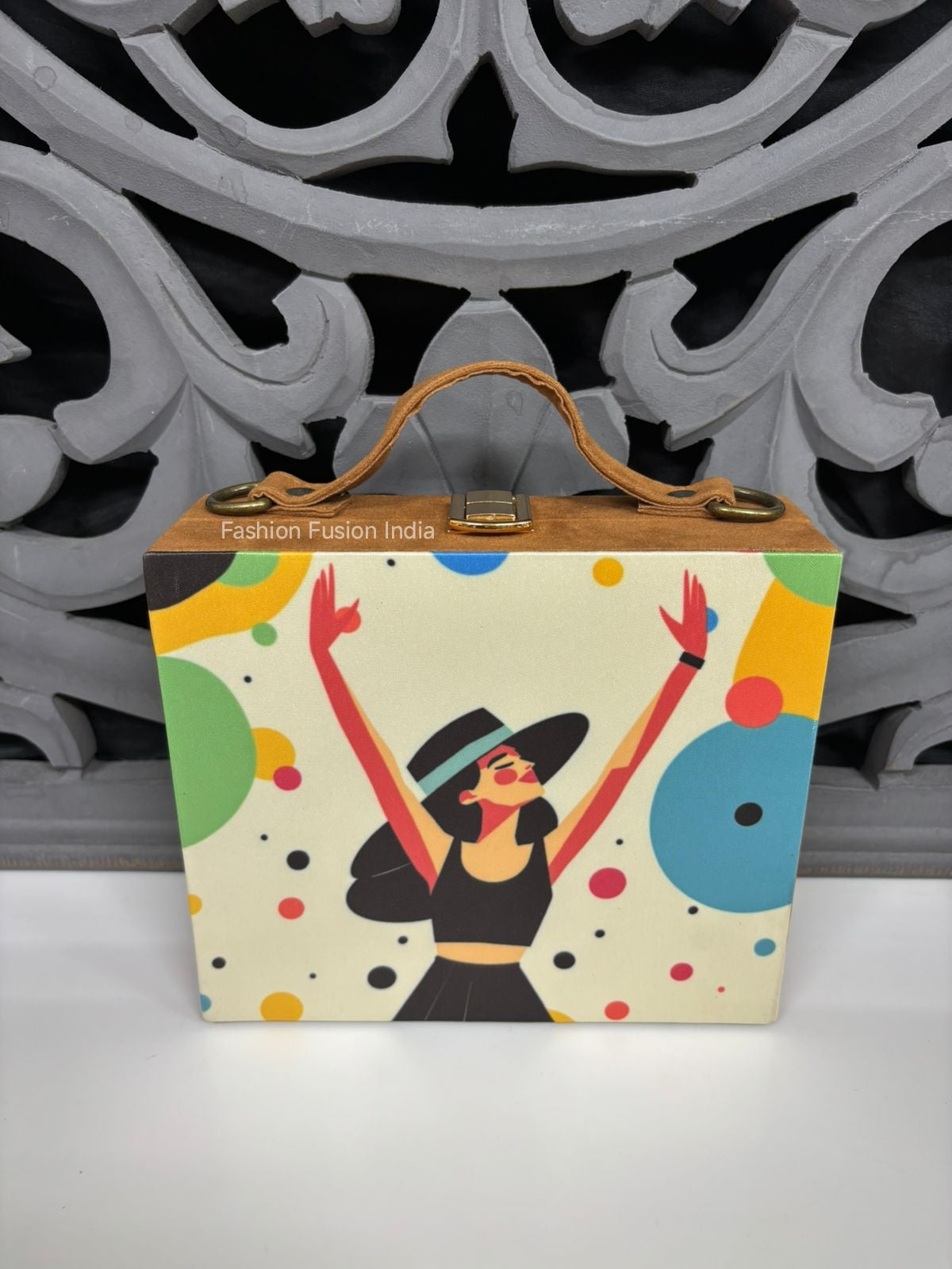 Modern printed wooden clutch bag with abstract female artwork against carved grey backdrop.
