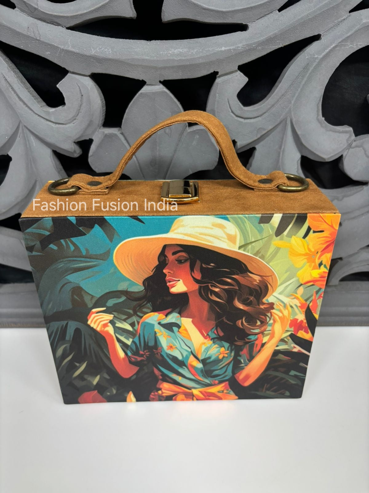 Artistic tropical-themed wooden clutch bag with elegant female artwork against carved grey backdrop.