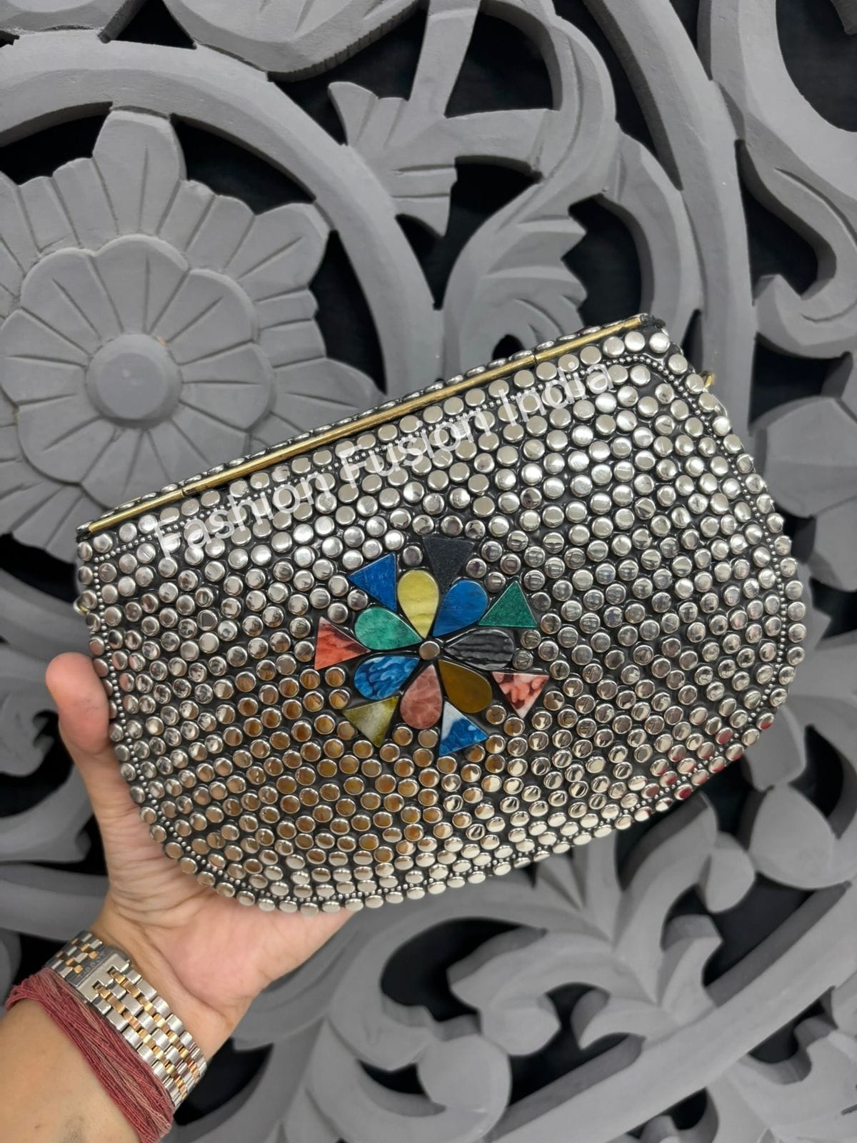hand-crafted ethnic statement clutch
