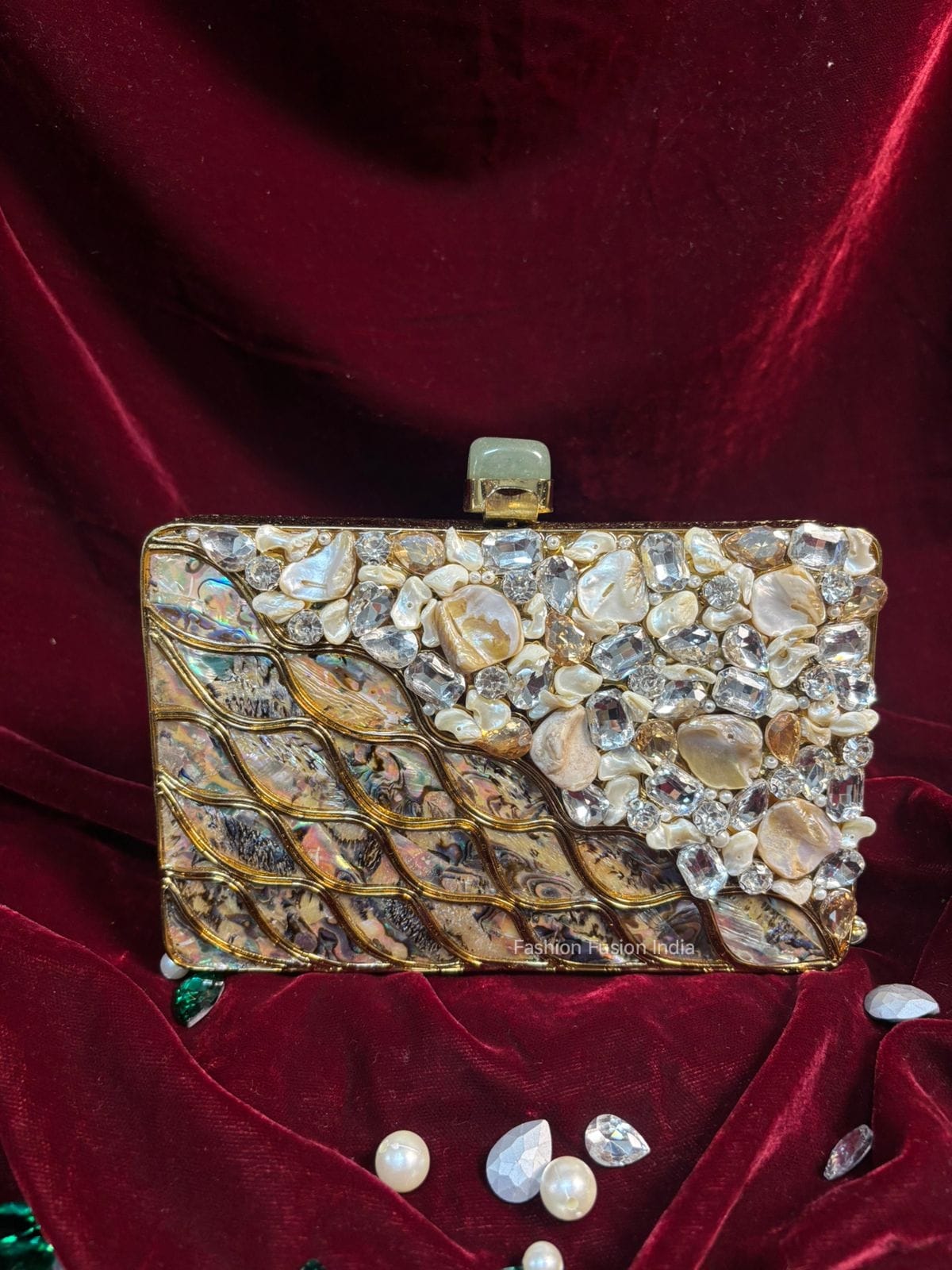 Decorative clutch bag with floral patterns on a red fabric background