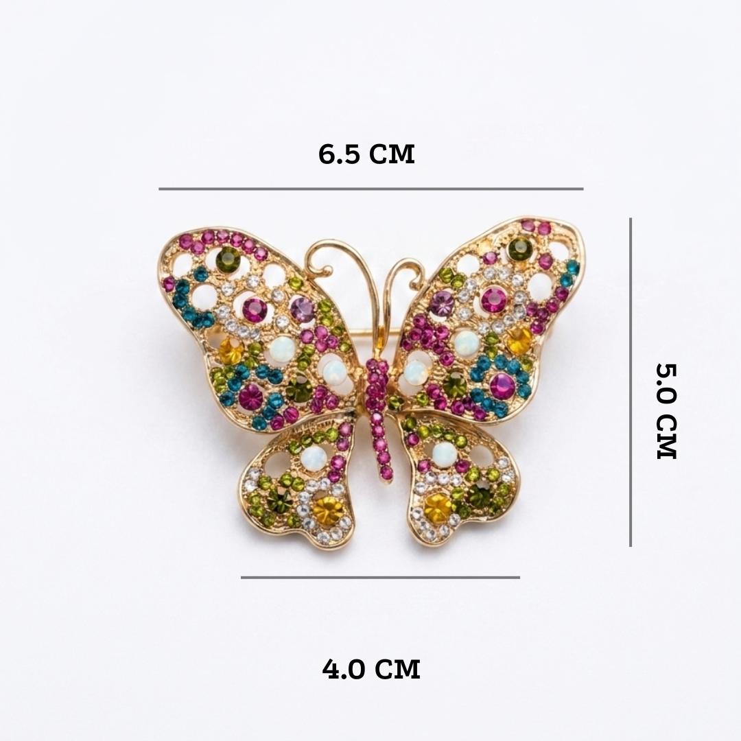 Butterfly-shaped brooch with colorful gemstones and measurements on a white background