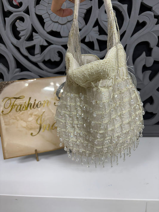 Beaded handbag with decorative background