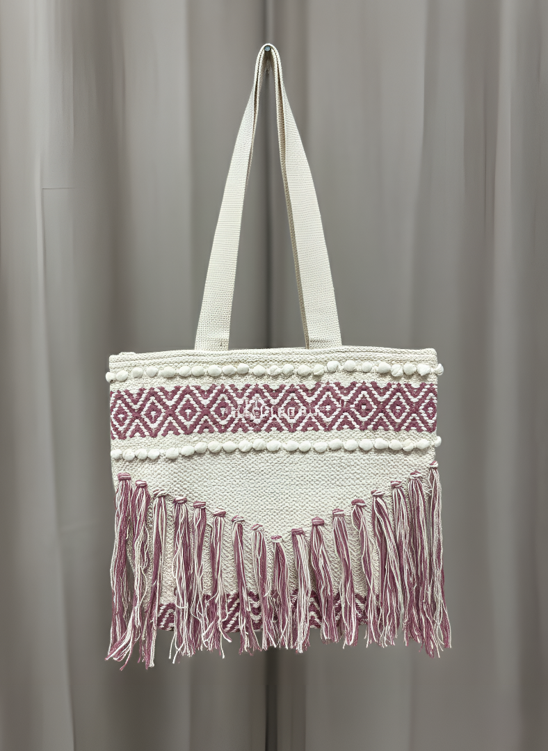 Tote bag with white handle and pink and white patterned design on a gray background