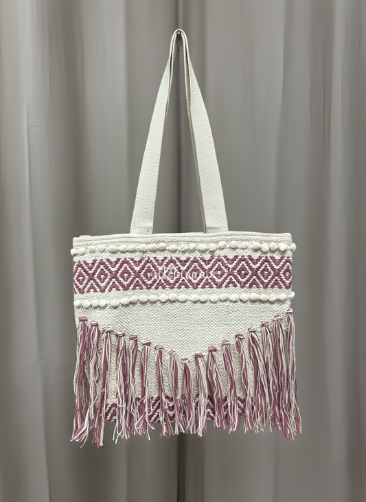 Tote bag with white handle and pink and white patterned design on a gray background