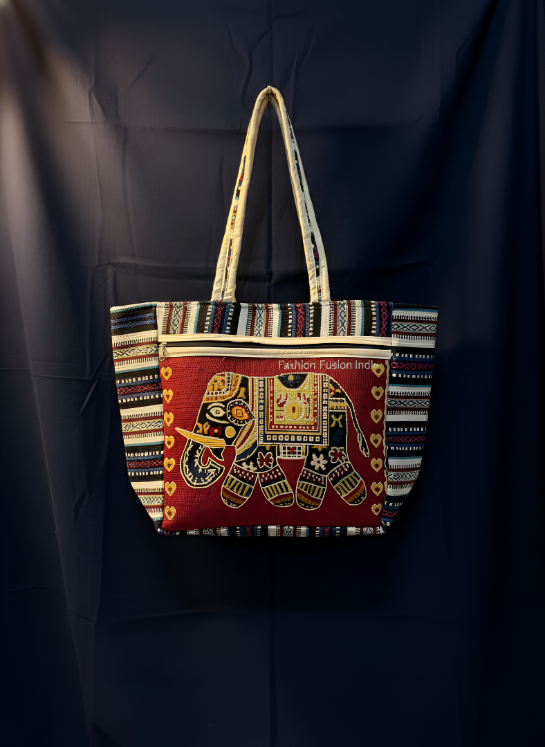 Decorative tote bag with elephant design on a dark background