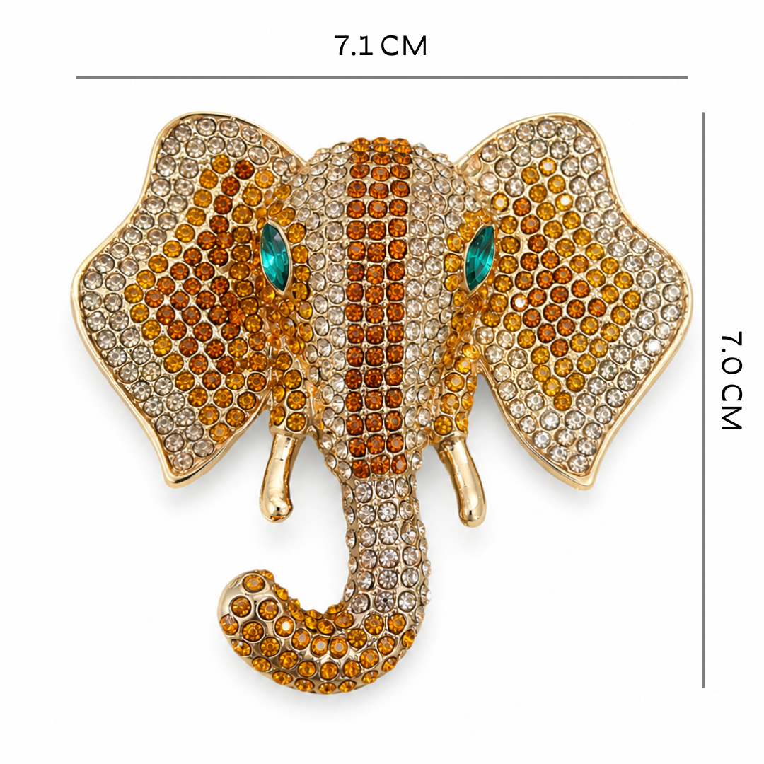 Decorative elephant brooch with gemstones and measurements on a white background