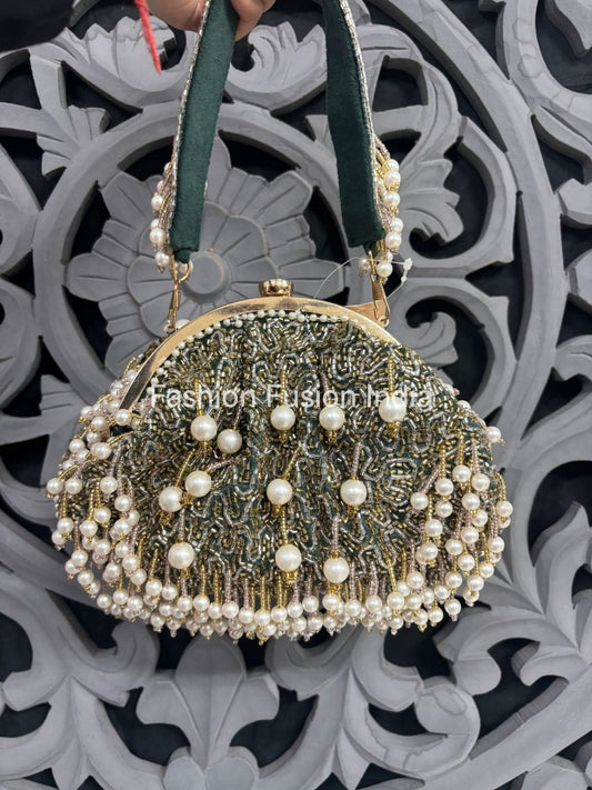Decorative handbag with pearls against a decorative background