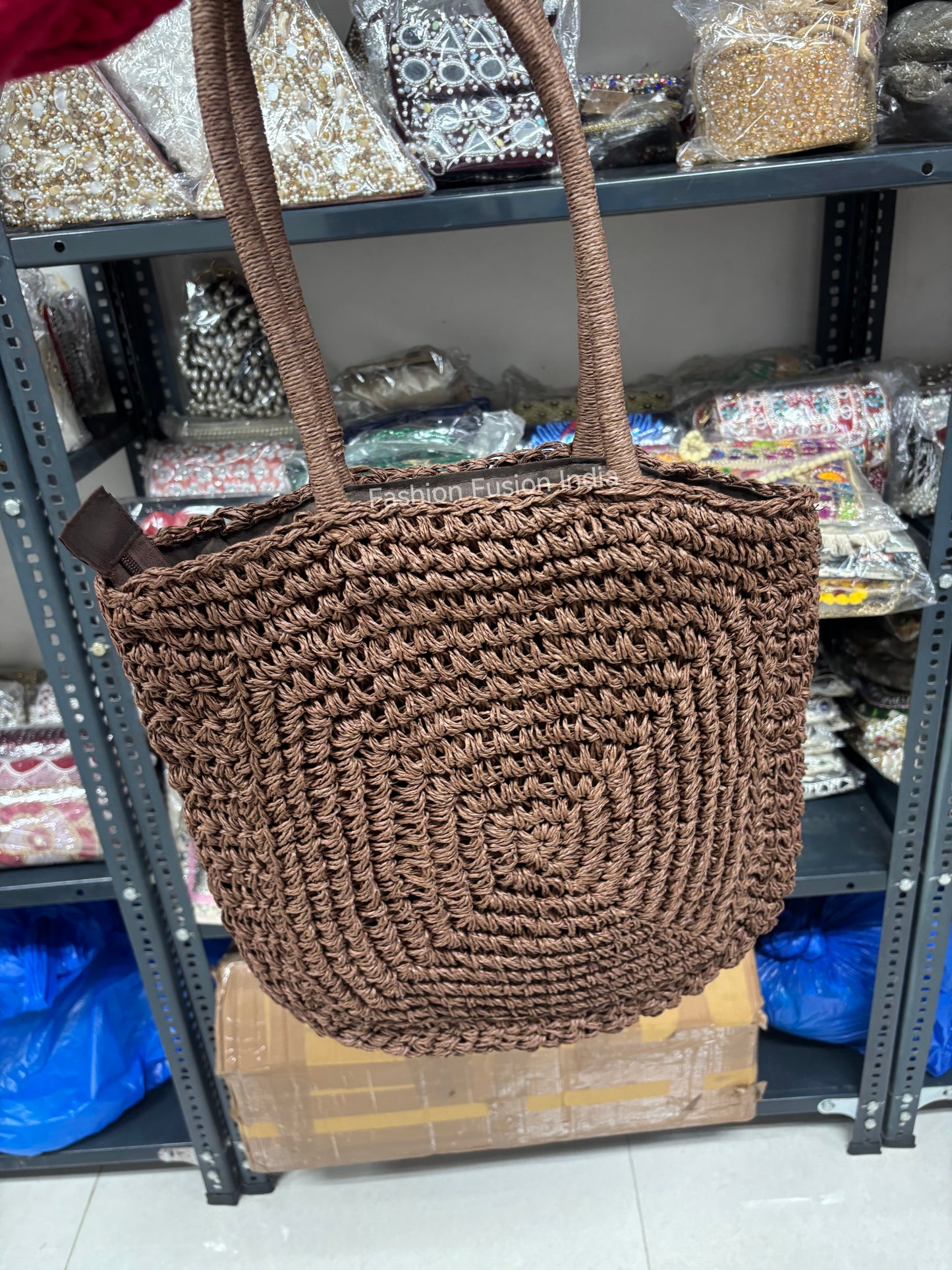 Brown handmade crochet tote bag with textured square pattern, eco-friendly woven shoulder bag