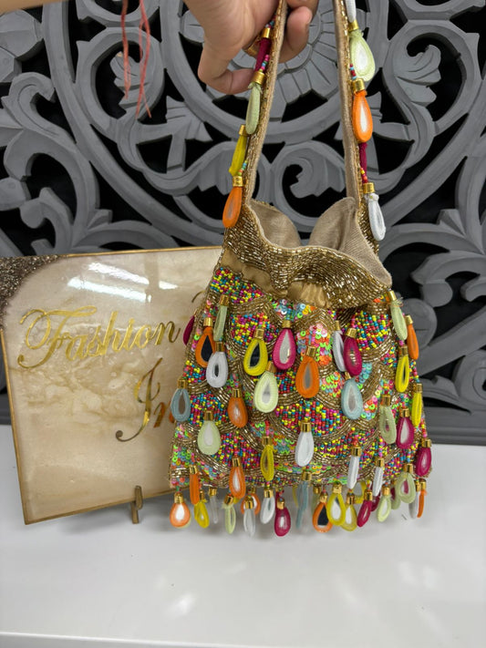 Colorful beaded handbag with a decorative background