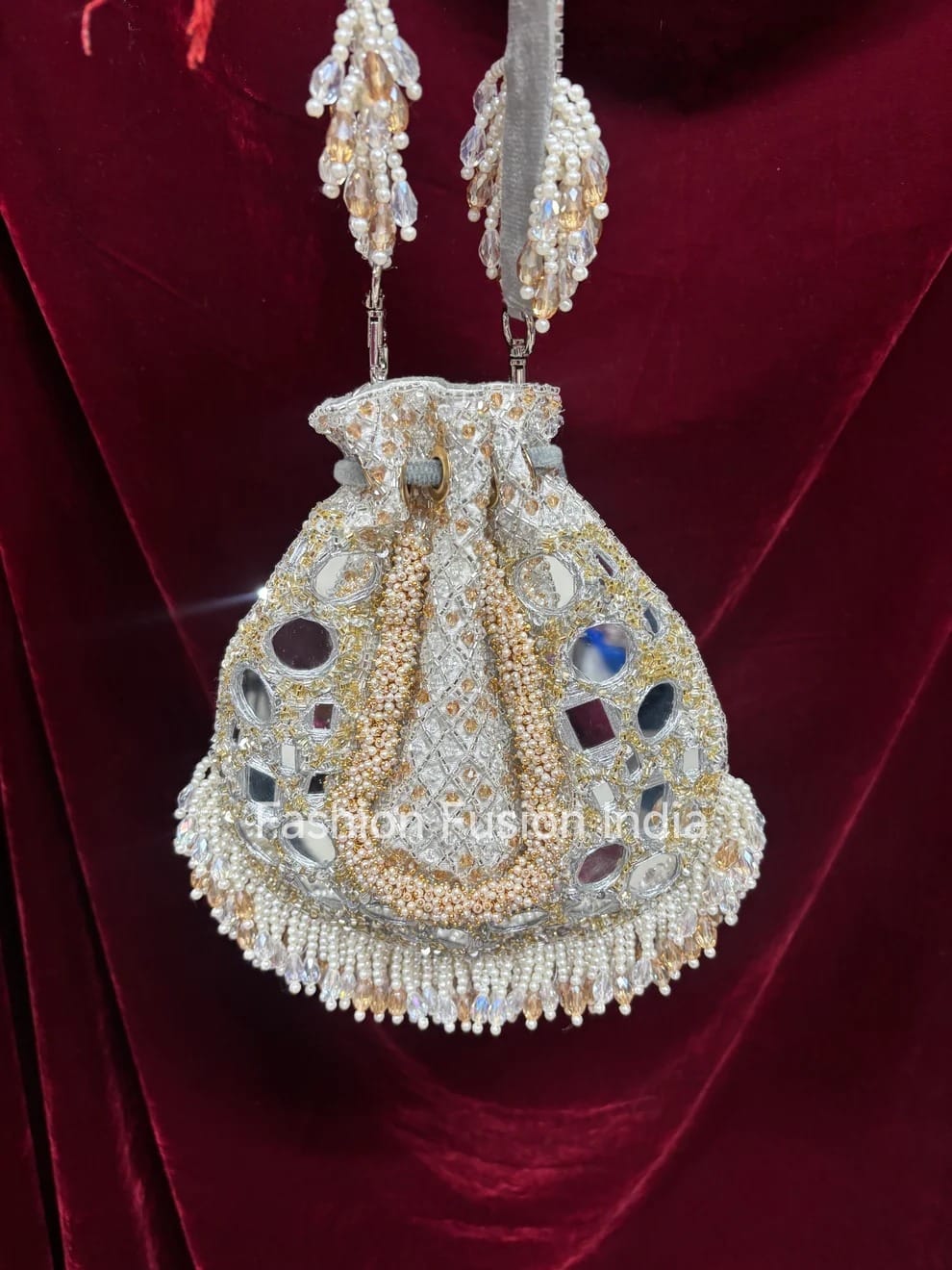Decorative handbag with jewelry on a red background