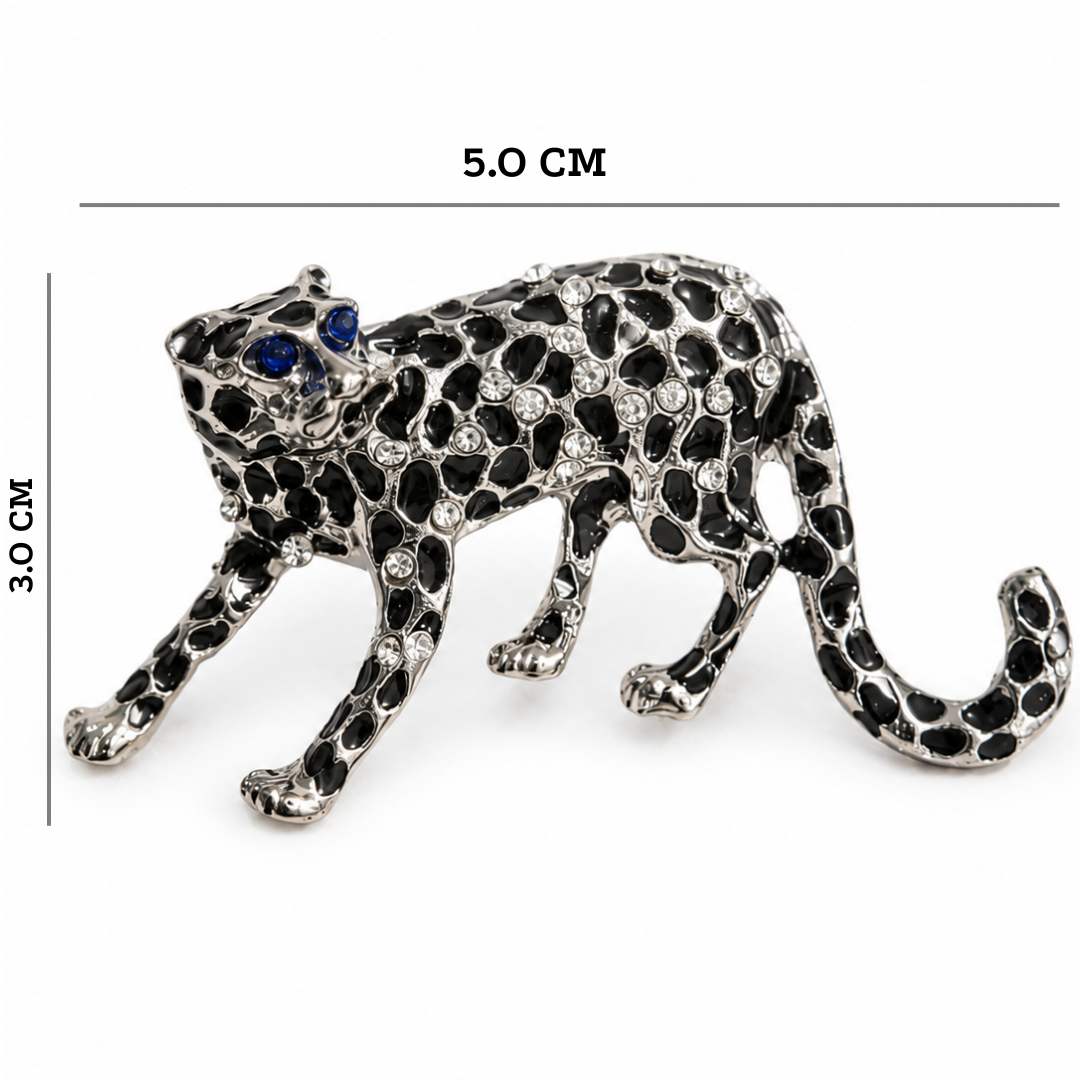Leopard-shaped brooch with black and silver details and blue eyes, shown with measurements on a white background.