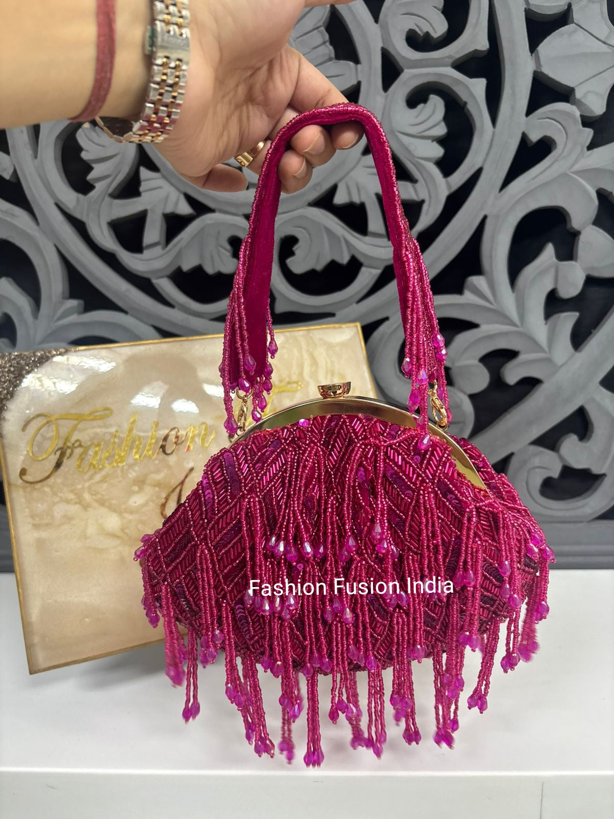 Pink crytsales batua bag with tassles