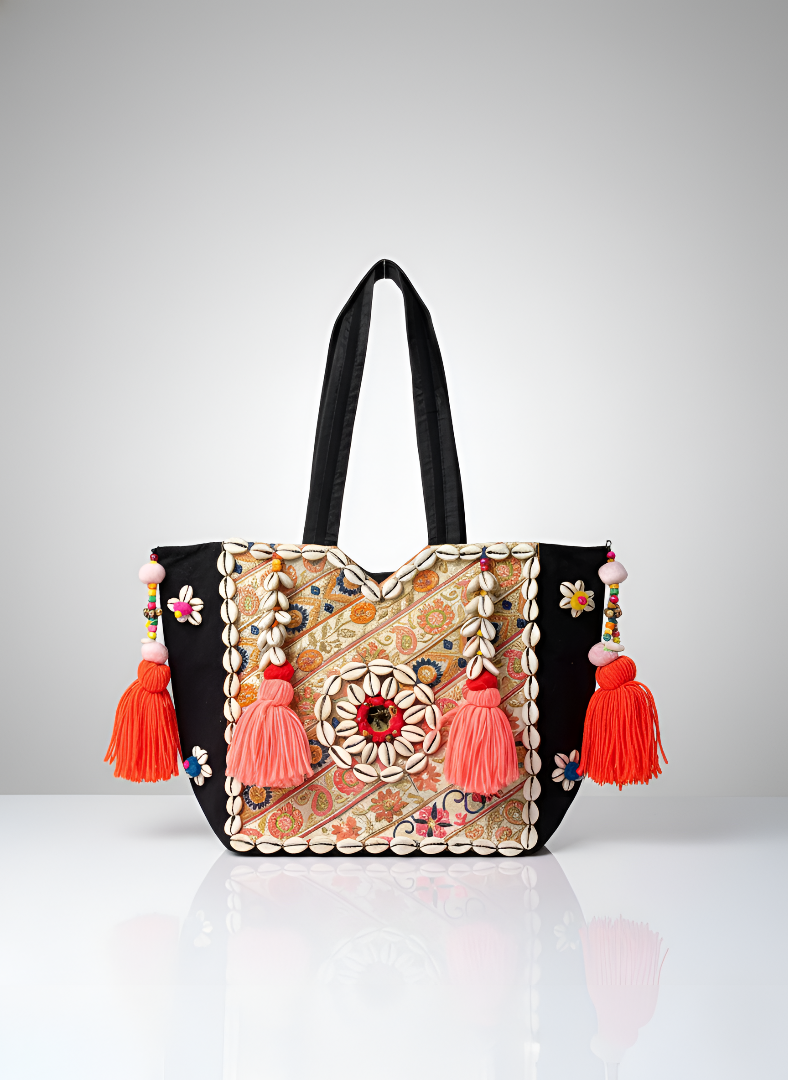 Decorative handbag with tassels on a white background