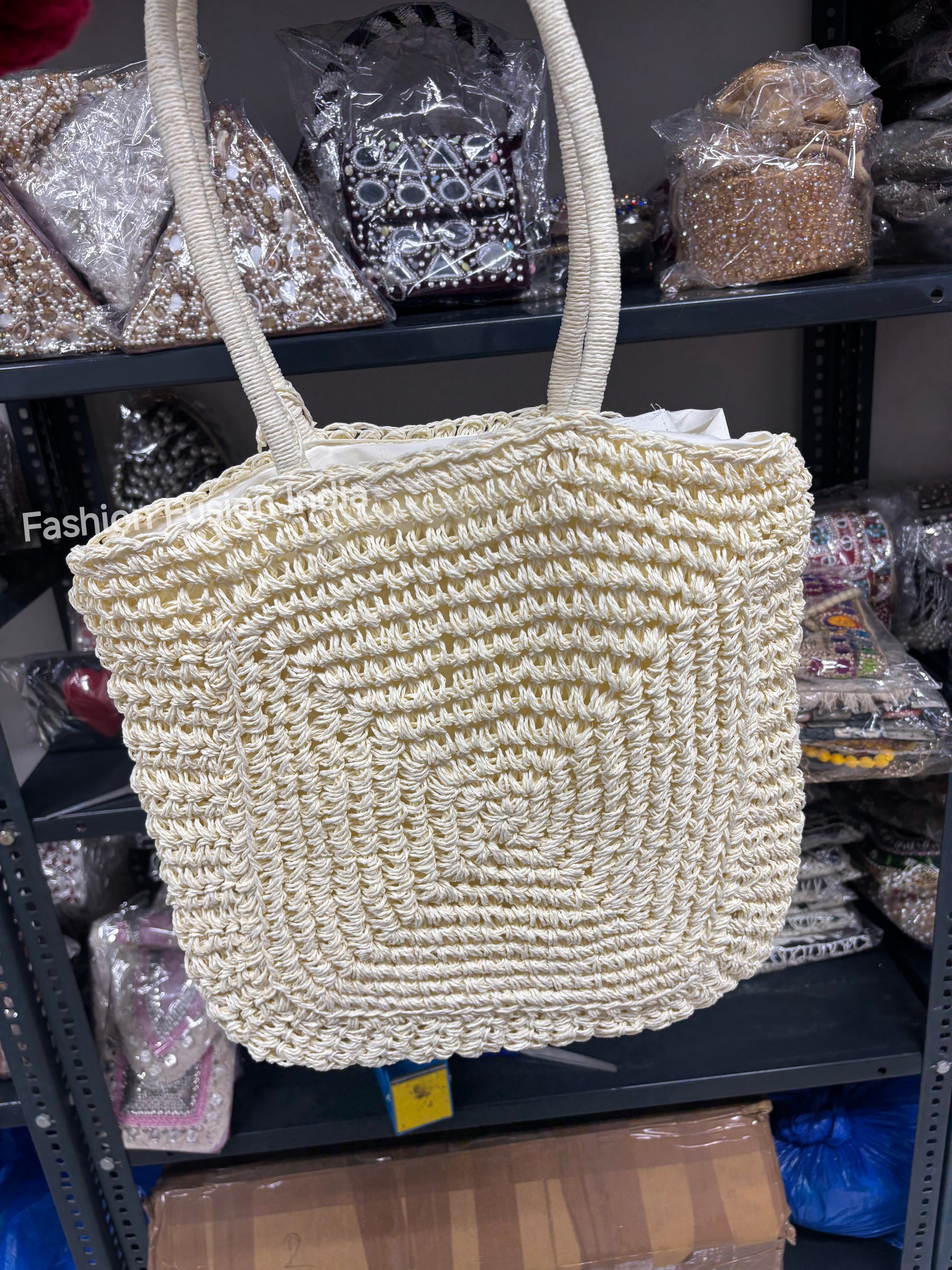 Cream handmade crochet tote bag with square spiral design, natural fiber woven shoulder bag