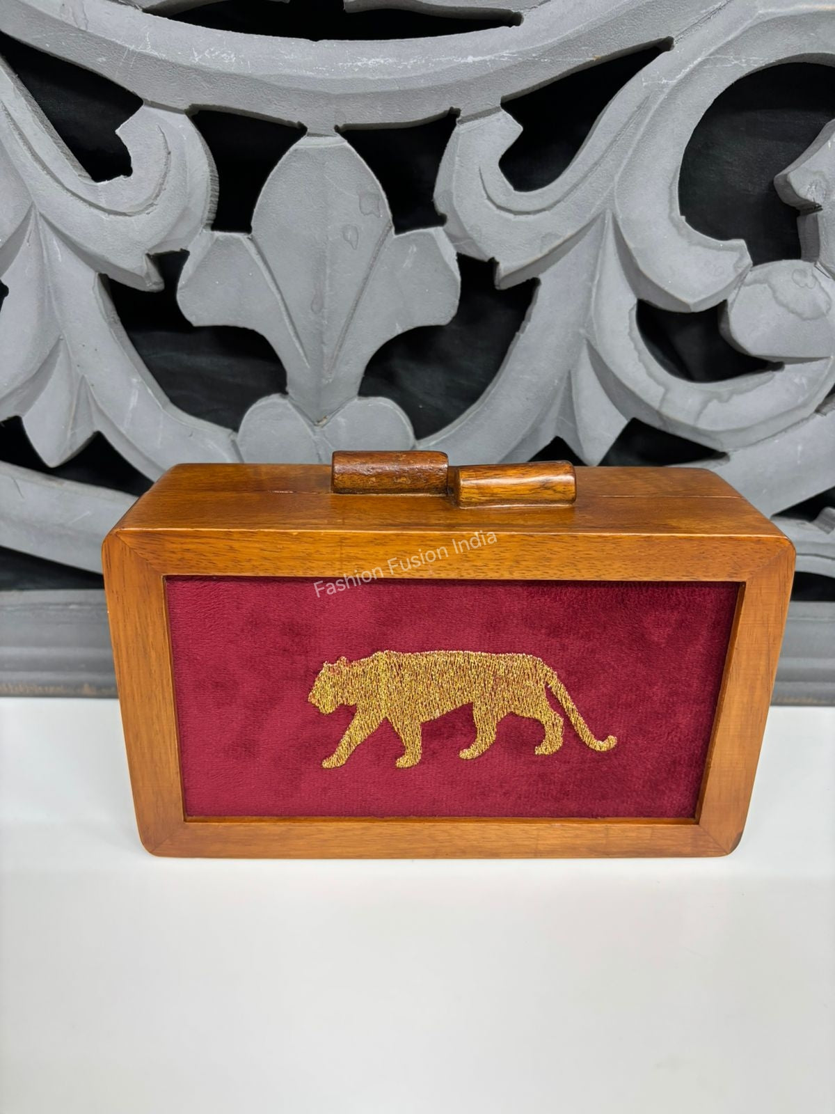 Handcrafted wooden box clutch with velvet tiger design.
