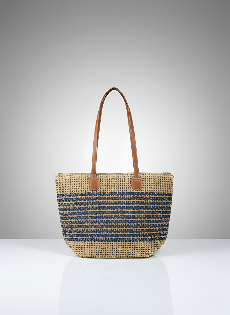 Woven handbag with blue and natural stripes on a gray background